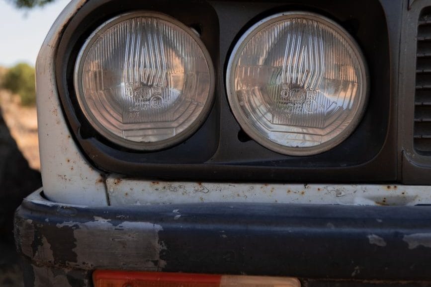 Close-up of a car headlight showing lens clarity